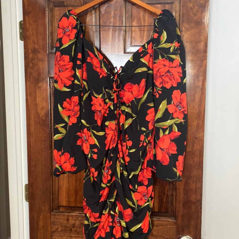 Dark floral dress. Not worn. New item without tags.